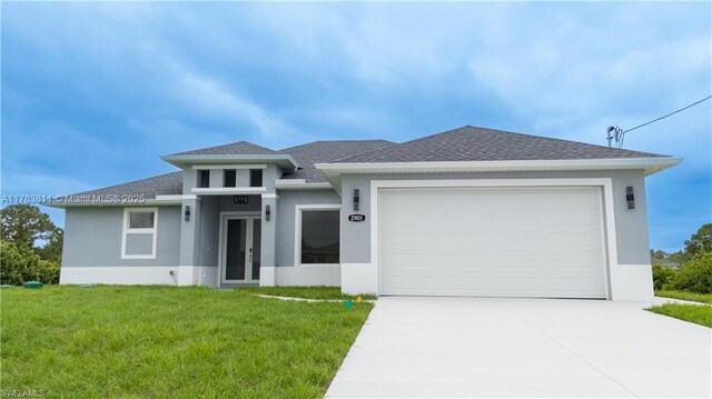2901 27th St SW, Lehigh Acres, FL 33976 - prairie-style house with concrete driveway, stucco siding, a garage, and a shingled roof