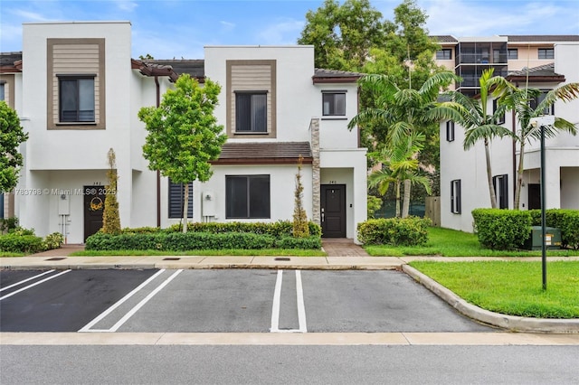 340 NE 208th Ter, Miami, FL 33179 - view of property featuring uncovered parking
