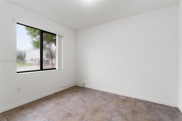 340 NE 208th Ter, Miami, FL 33179 - empty room with baseboards