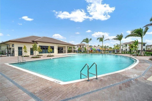 340 NE 208th Ter, Miami, FL 33179 - community pool featuring fence and a patio
