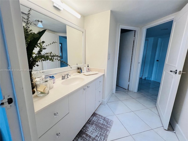 2333 Brickell Ave Unit 1516, Miami, FL 33129 - bathroom featuring tile patterned floors, vanity, and baseboards