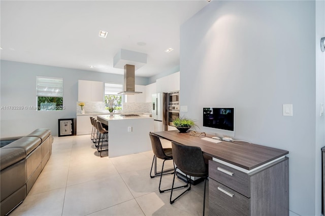 office area with light tile patterned floors