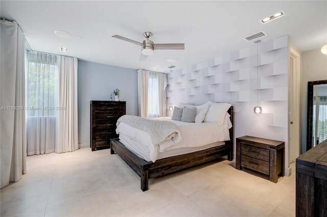 bedroom featuring visible vents and ceiling fan