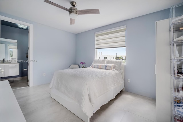 bedroom with a ceiling fan and multiple windows