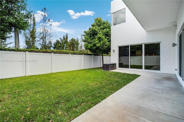 view of yard with a fenced backyard
