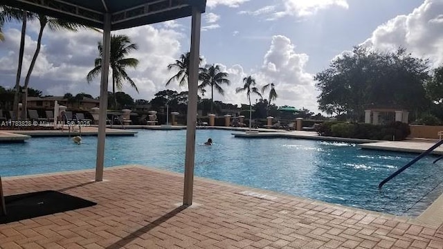 7751 Southampton Ter Unit 216, Tamarac, FL 33321 - community pool featuring a patio