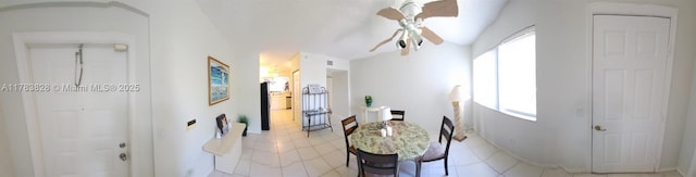 7751 Southampton Ter Unit 216, Tamarac, FL 33321 - dining area featuring a ceiling fan, light tile patterned floors, lofted ceiling, and baseboards