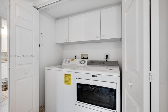 7751 Southampton Ter Unit 216, Tamarac, FL 33321 - washroom with cabinet space and washer and clothes dryer