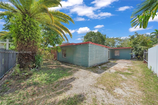 exterior space featuring a fenced backyard