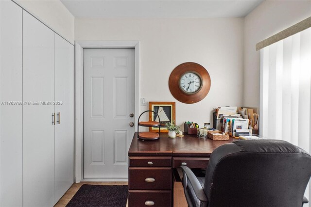 9909 NW 52nd Ln, Doral, FL 33178 - office area featuring light wood-style flooring