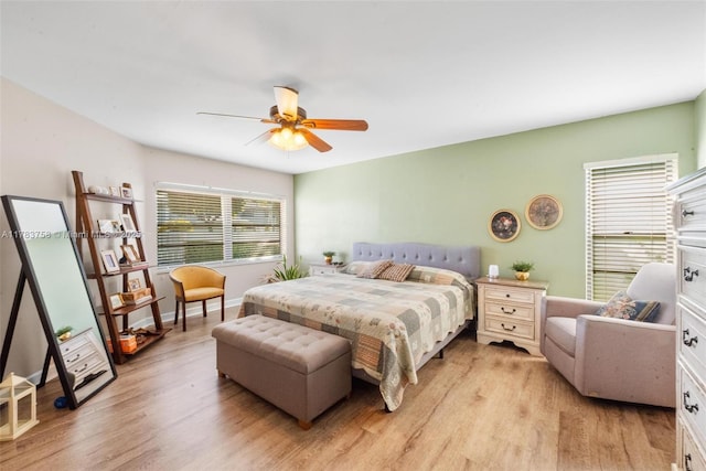 9909 NW 52nd Ln, Doral, FL 33178 - bedroom with light wood-type flooring and a ceiling fan