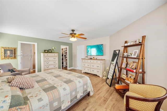 9909 NW 52nd Ln, Doral, FL 33178 - bedroom featuring light wood finished floors, a ceiling fan, and baseboards