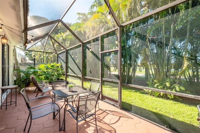 9909 NW 52nd Ln, Doral, FL 33178 - sunroom / solarium with outdoor dining area