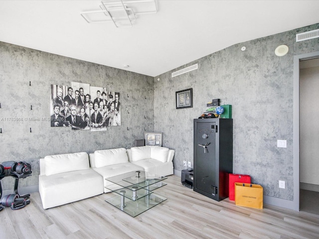 18555 Collins Ave Unit 5505, Sunny Isles Beach, FL 33160 - living room featuring wood finished floors