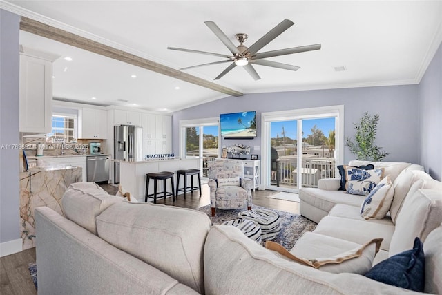 234 Allen Ave, Key Largo, FL 33037 - living area featuring dark wood-style flooring, a wealth of natural light, a ceiling fan, and lofted ceiling