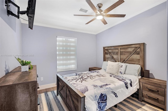 234 Allen Ave, Key Largo, FL 33037 - bedroom with crown molding, wood finished floors, baseboards, and visible vents