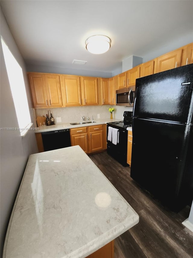285 Fanshaw G 285G, Boca Raton, FL 33434 - kitchen featuring a sink, light countertops, black appliances, and dark wood finished floors