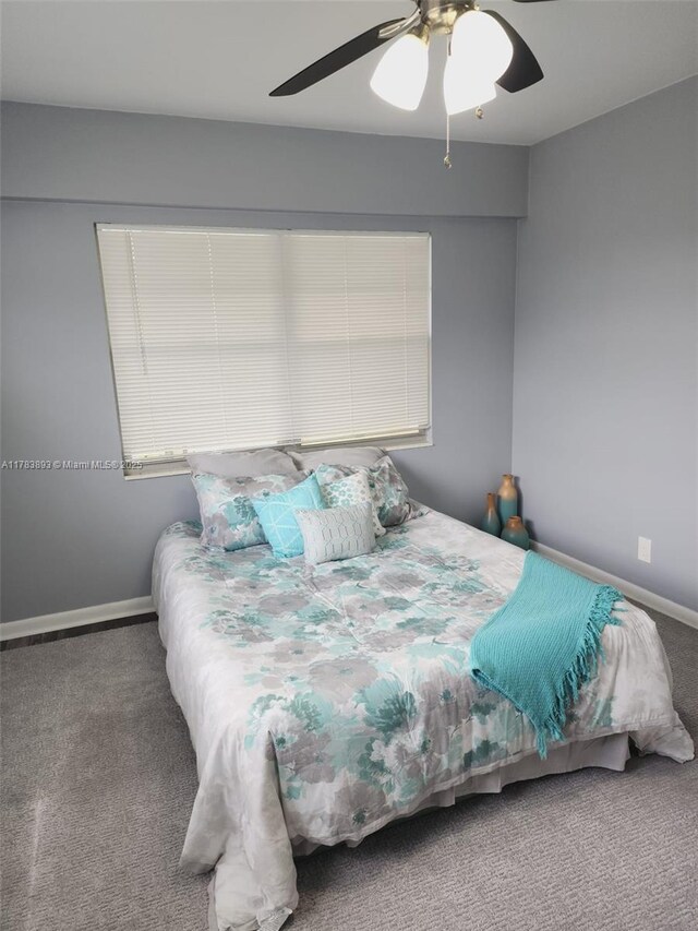 285 Fanshaw G 285G, Boca Raton, FL 33434 - carpeted bedroom featuring baseboards and a ceiling fan
