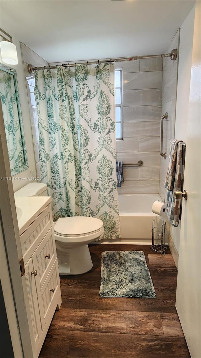 285 Fanshaw G 285G, Boca Raton, FL 33434 - full bathroom featuring toilet, wood finished floors, shower / bath combo with shower curtain, and vanity