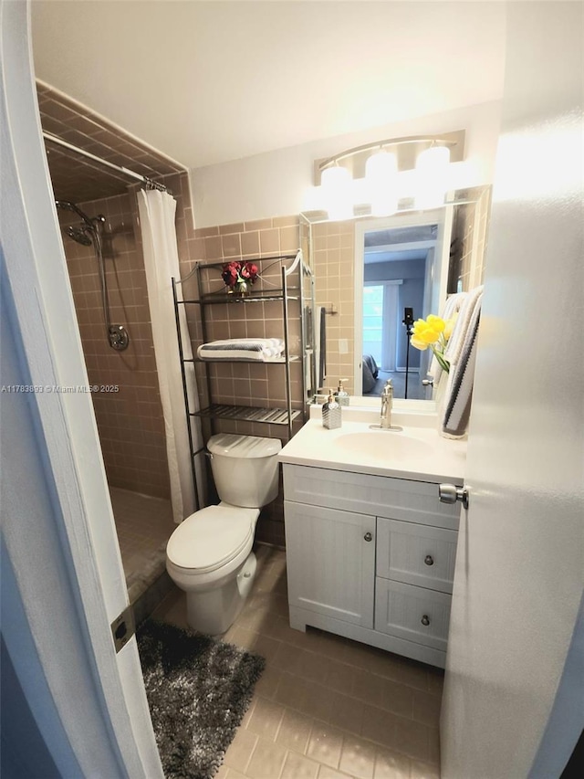285 Fanshaw G 285G, Boca Raton, FL 33434 - bathroom with tile walls, toilet, a shower stall, vanity, and tile patterned flooring