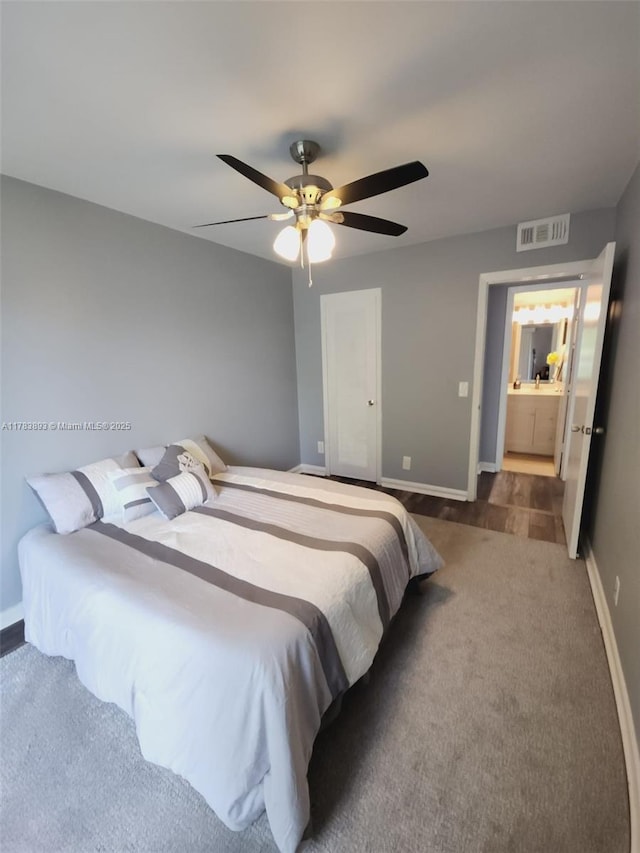 285 Fanshaw G 285G, Boca Raton, FL 33434 - carpeted bedroom featuring visible vents, baseboards, and a ceiling fan