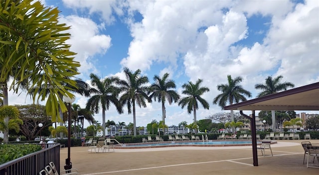 285 Fanshaw G 285G, Boca Raton, FL 33434 - view of community with a swimming pool, a patio, and fence