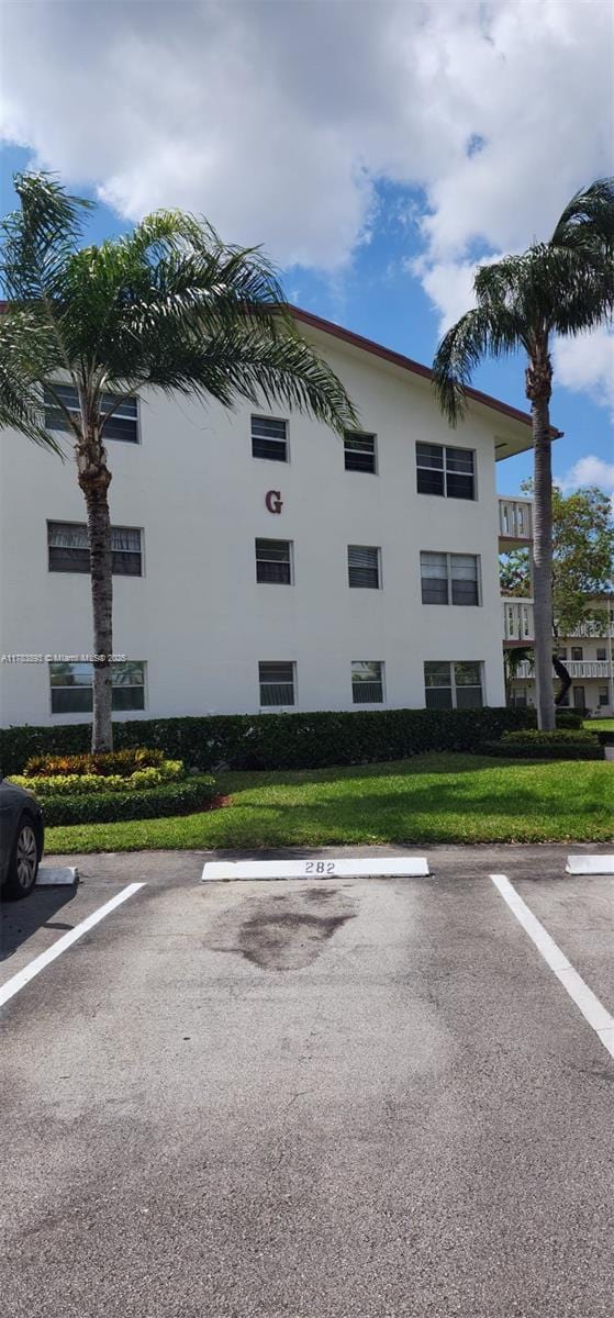 285 Fanshaw G 285G, Boca Raton, FL 33434 - view of property featuring uncovered parking