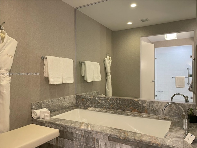 551 N Fort Lauderdale Beach Blvd Unit H1403, Fort Lauderdale, FL 33304 - full bathroom with recessed lighting, visible vents, and tiled shower
