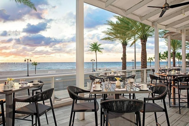551 N Fort Lauderdale Beach Blvd Unit H1403, Fort Lauderdale, FL 33304 - exterior space featuring a water view, ceiling fan, and outdoor dining space