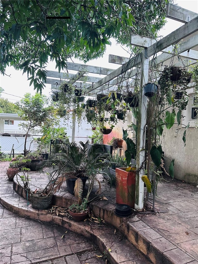 4371 SW 14th St, Miami, FL 33134 - exterior space featuring a patio area, fence, and a pergola
