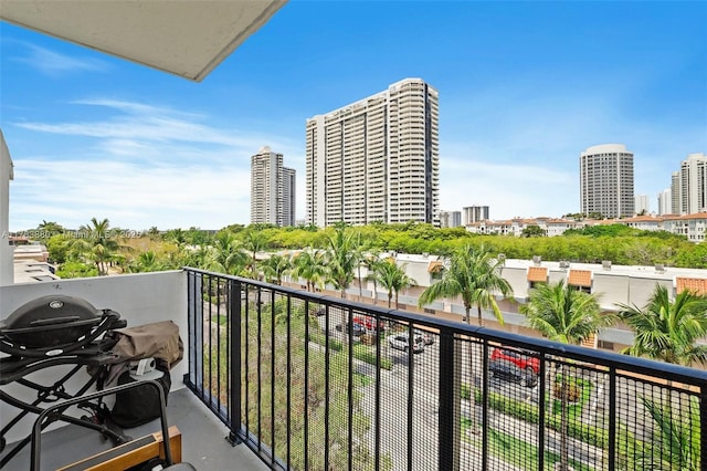 balcony featuring a grill and a city view