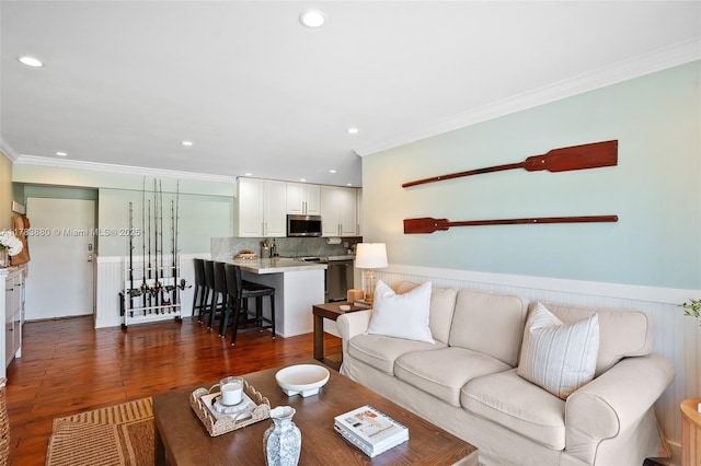 living room featuring crown molding, recessed lighting, and wood finished floors