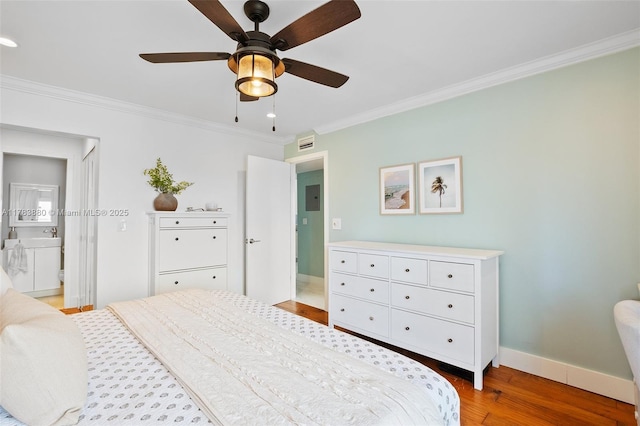 bedroom with baseboards, crown molding, light wood-style floors, visible vents, and ceiling fan