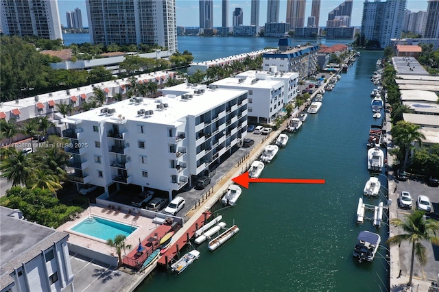 bird's eye view with a city view and a water view
