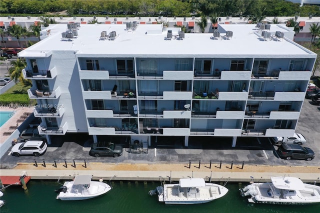 view of building exterior with a water view
