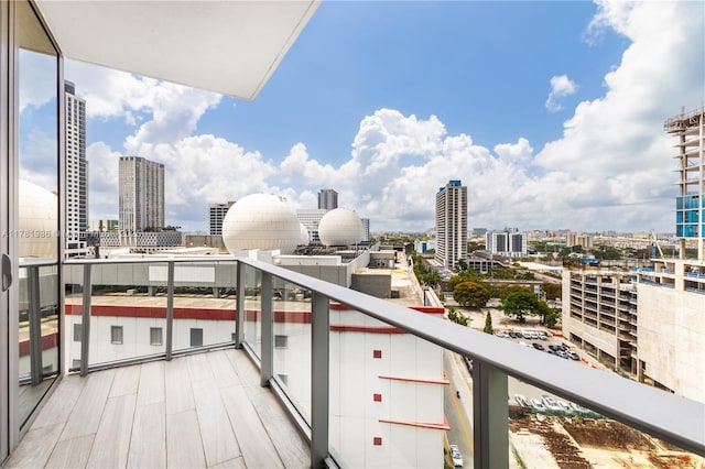 balcony featuring a city view