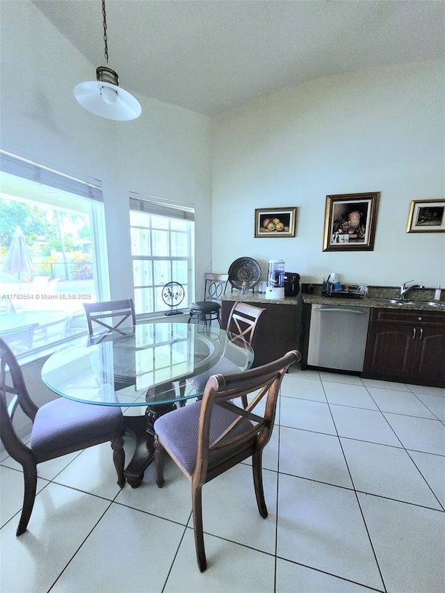 dining room with light tile patterned flooring