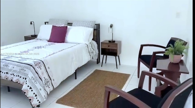 bedroom featuring tile patterned flooring