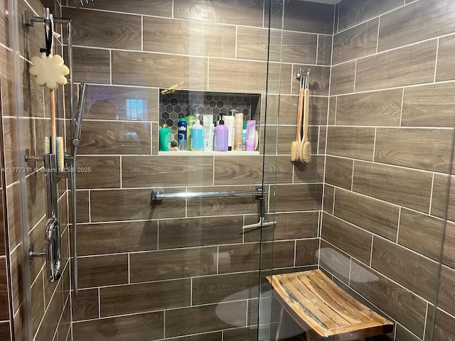 bathroom with a stall shower