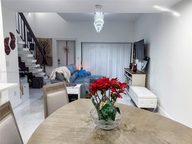 10505 SW 153rd Ct Unit 2, Miami, FL 33196 - dining area with a chandelier, stairway, and marble finish floor