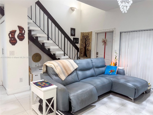 10505 SW 153rd Ct Unit 2, Miami, FL 33196 - living area with marble finish floor, baseboards, and stairs