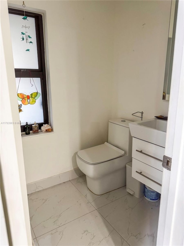 10505 SW 153rd Ct Unit 2, Miami, FL 33196 - bathroom with toilet, marble finish floor, baseboards, and vanity