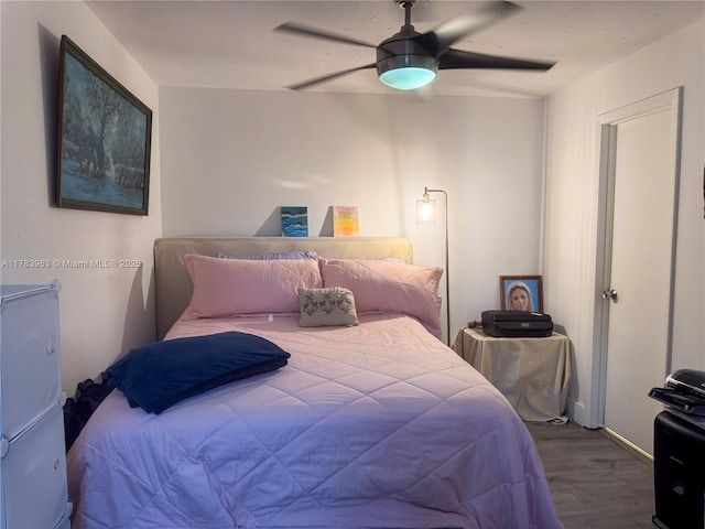 10505 SW 153rd Ct Unit 2, Miami, FL 33196 - bedroom with ceiling fan, wood finished floors, and baseboards