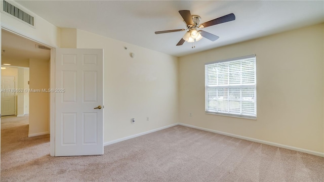 4105 Residence Dr Unit 709, Fort Myers, FL 33901 - spare room featuring visible vents, ceiling fan, carpet floors, and baseboards