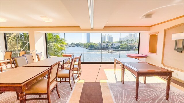19667 Turnberry Way Unit 3F, Aventura, FL 33180 - sunroom featuring healthy amount of natural light, a city view, and a water view