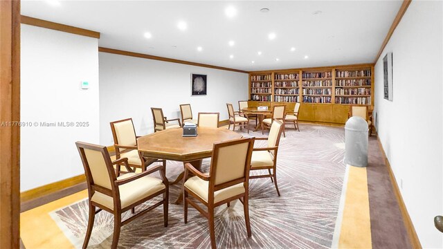 19667 Turnberry Way Unit 3F, Aventura, FL 33180 - dining area featuring crown molding, recessed lighting, built in features, baseboards, and carpet