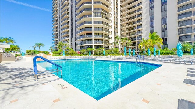 19667 Turnberry Way Unit 3F, Aventura, FL 33180 - community pool with a patio area