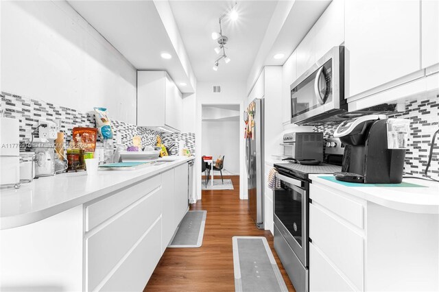 19667 Turnberry Way Unit 3F, Aventura, FL 33180 - kitchen with stainless steel appliances, modern cabinets, and white cabinets