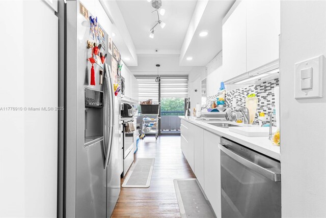 19667 Turnberry Way Unit 3F, Aventura, FL 33180 - kitchen featuring stainless steel appliances, modern cabinets, white cabinets, and recessed lighting