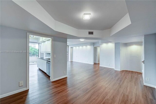 19667 Turnberry Way Unit 3F, Aventura, FL 33180 - spare room with baseboards and wood finished floors